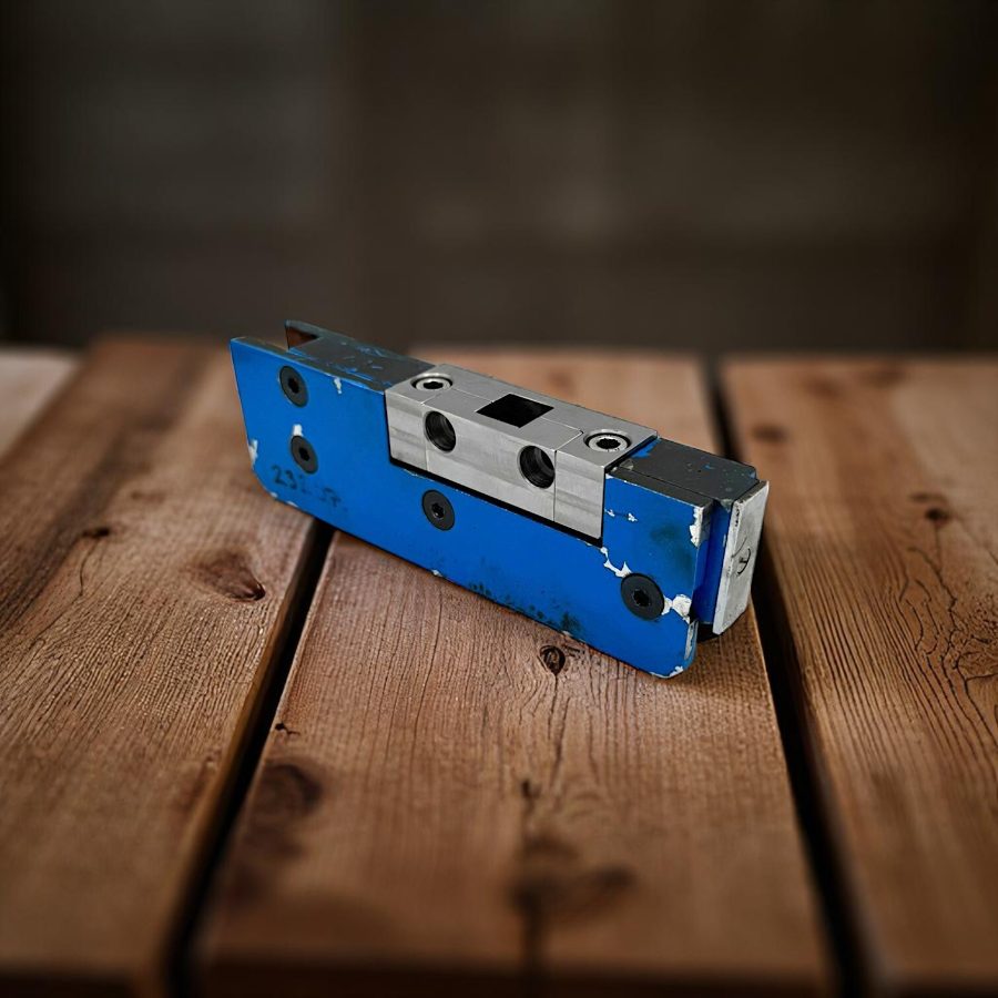 A patch fitting door closer on a workbench