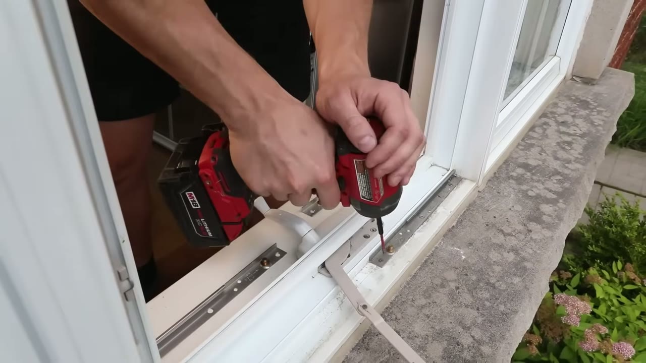 New bottom hinge track screwed down to the sill through the original holes