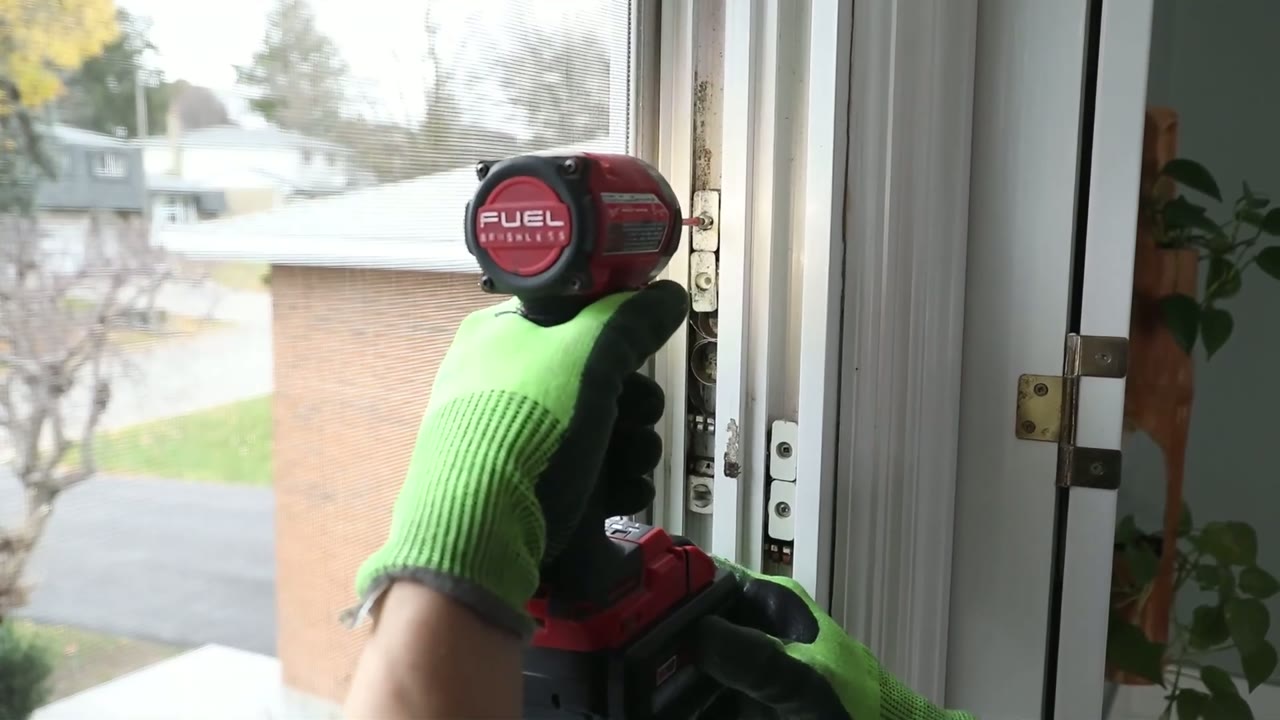 Backing the old balance's mounting screws out of the window channel